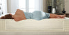 woman sleeping on her side showing spinal alignment