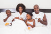 family on a mattress
