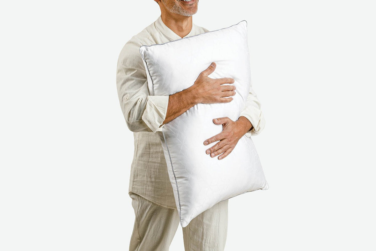 man with latex pillow